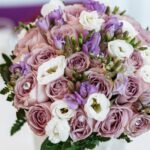 Elegant bridal bouquet featuring pastel roses and lisianthus, perfect for weddings and romantic occasions.
